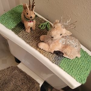 Handmade knitted toilet tank cover topper.